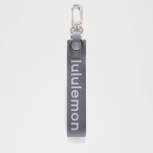 Lululemon Never Lost keychain NWT solar grey/starch blue